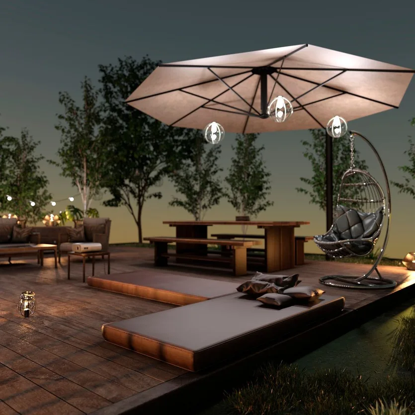 Terrasse mit beleuchtetem Sonnenschirm im Dunkeln mit Liegen auf einer Natursteinterrasse